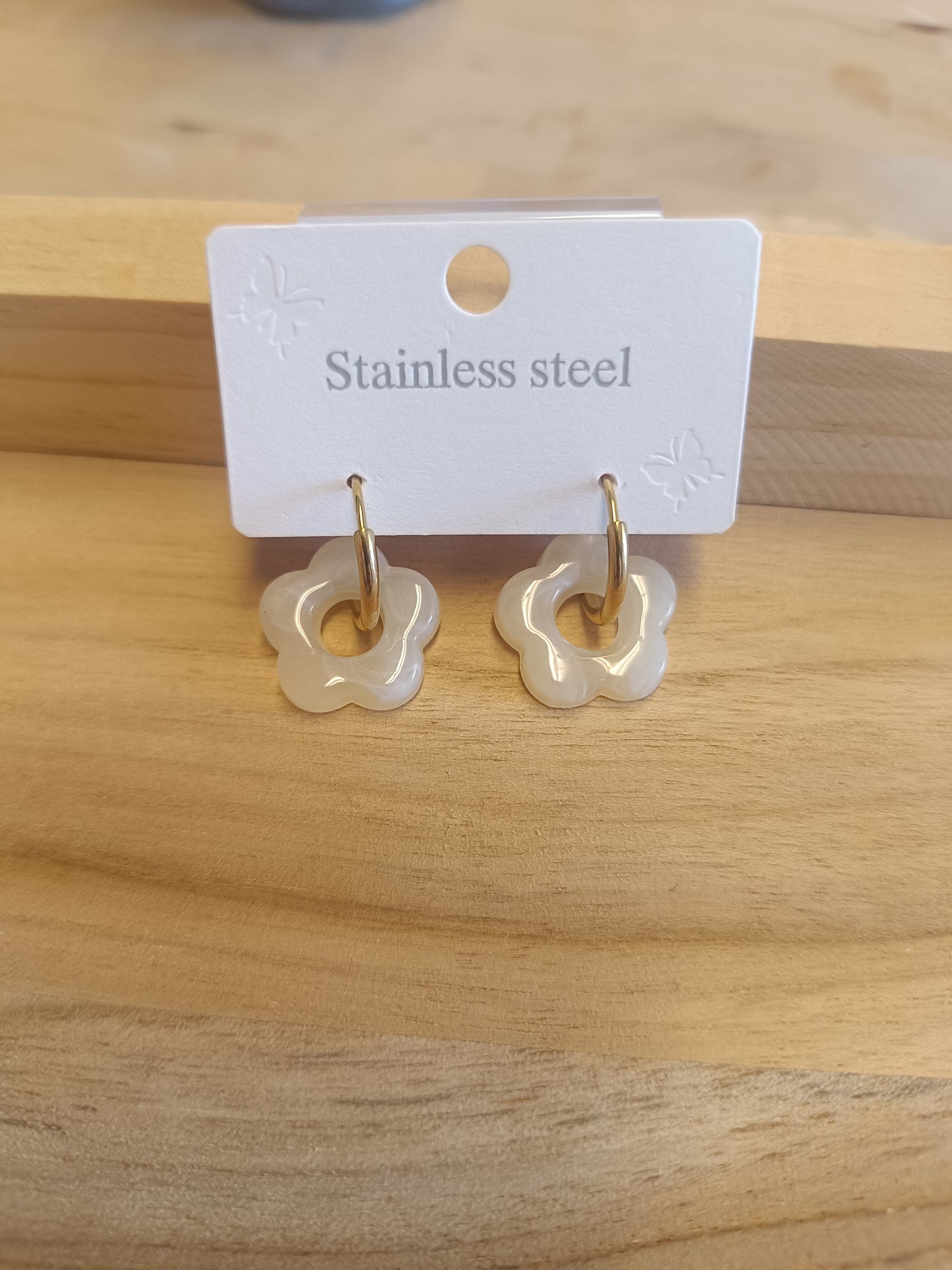 Boucles d'oreille blanc brillant