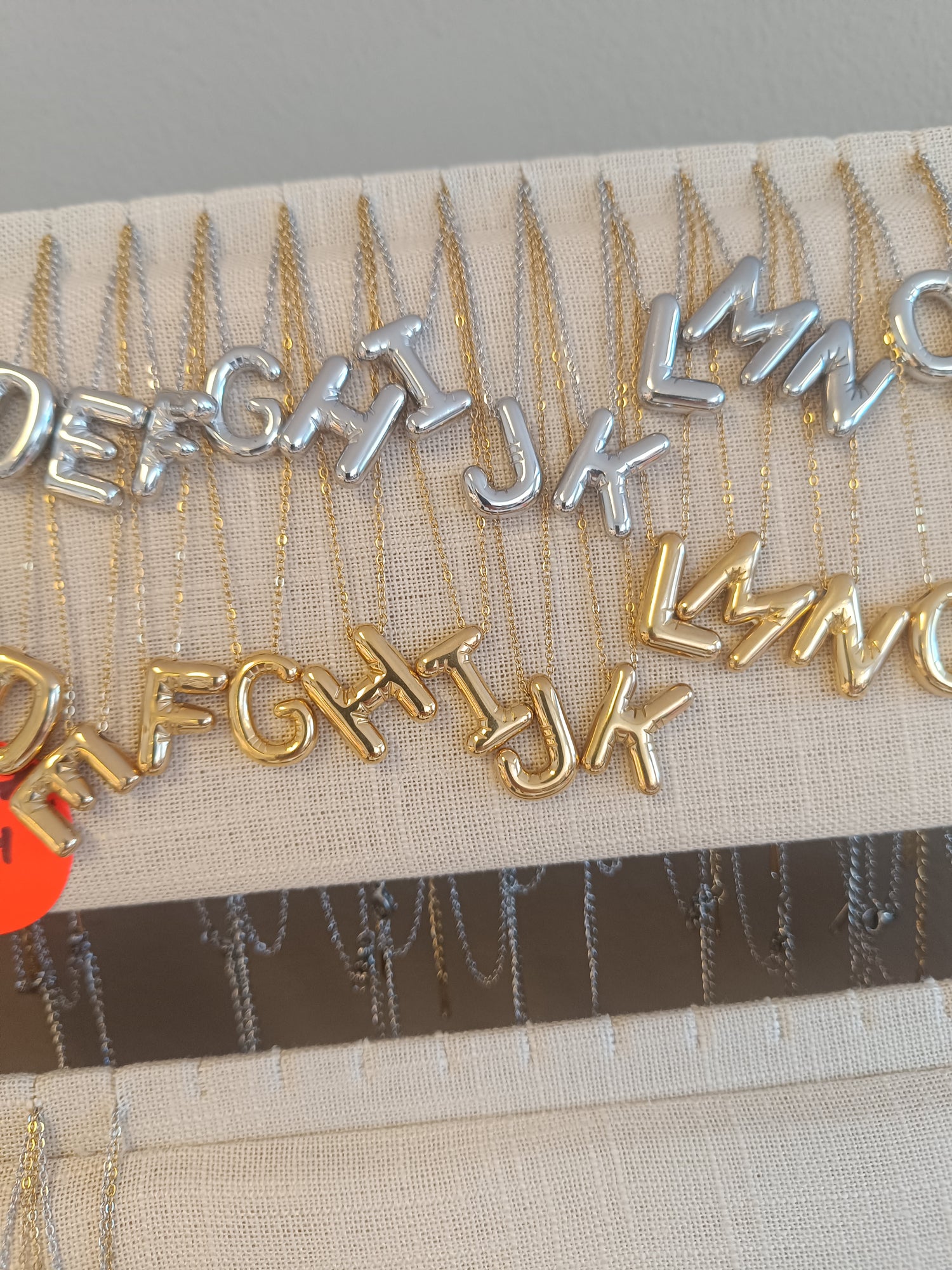 Collier lettre ballon bulle